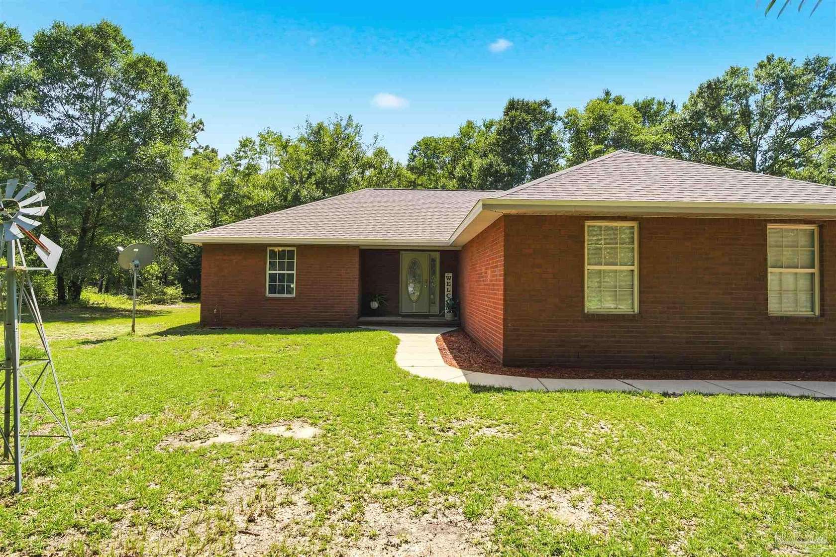 2.37 Acres of Land with Home for Sale in Holt, Florida