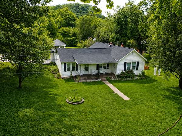 18.2 Acres of Land with Home for Sale in Pegram, Tennessee