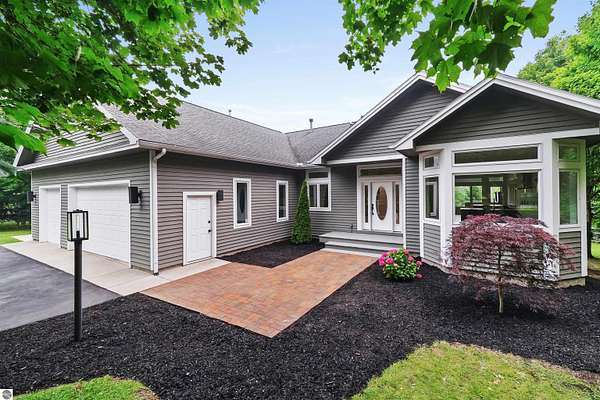 3 Acres of Land with Home for Sale in Suttons Bay, Michigan
