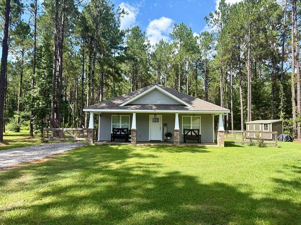 2.19 Acres of Land with Home for Sale in Carriere, Mississippi
