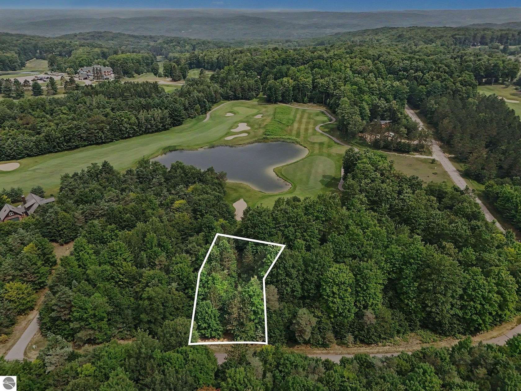 0.58 Acres of Residential Land for Sale in Bellaire, Michigan