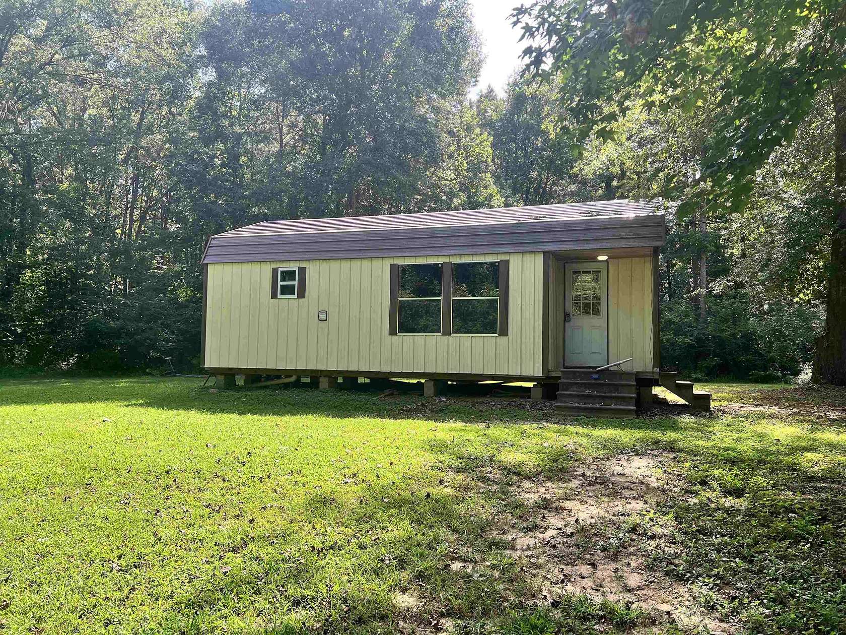 3.13 Acres of Land with Home for Sale in Joaquin, Texas
