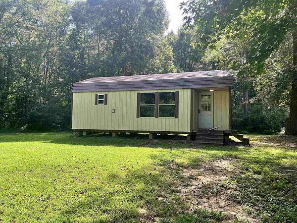 3.13 Acres of Land with Home for Sale in Joaquin, Texas