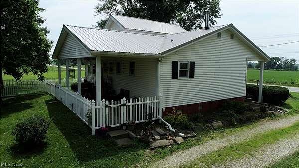 11.6 Acres of Land with Home for Sale in Sullivan, Ohio