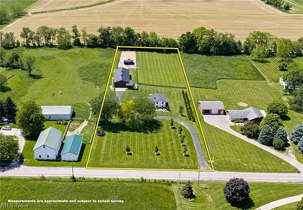 2.8 Acres of Land with Home for Auction in Dalton, Ohio
