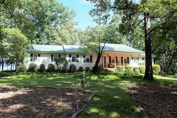 7 Acres of Land with Home for Sale in Murray, Kentucky
