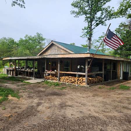 5 Acres of Land with Home for Sale in Idlewild, Michigan