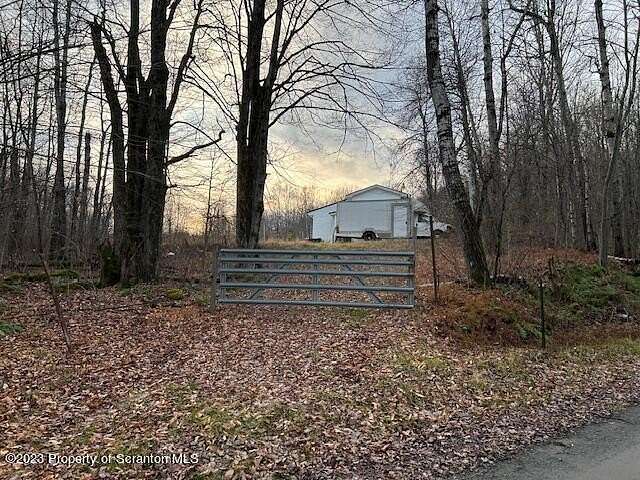 7.1 Acres of Land with Home for Sale in Union Dale, Pennsylvania