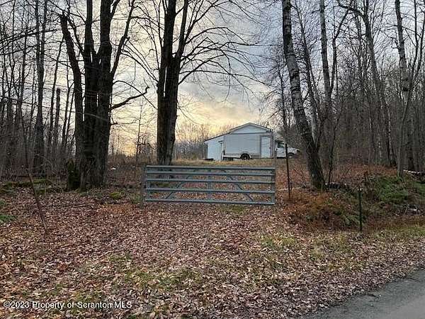 7.1 Acres of Land with Home for Sale in Union Dale, Pennsylvania