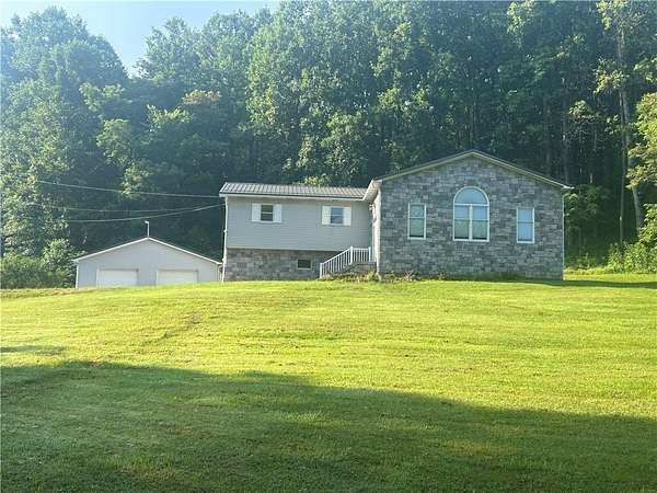8.5 Acres of Land with Home for Sale in Connellsville, Pennsylvania