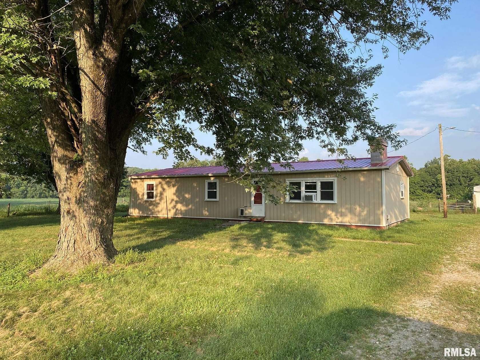 5 Acres of Land with Home for Sale in Canton, Illinois