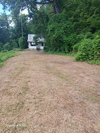 7.6 Acres of Land with Home for Sale in Prestonsburg, Kentucky