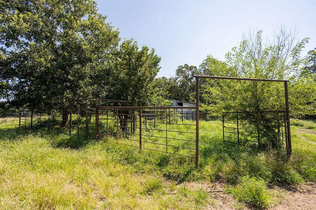 73.3 Acres of Land with Home for Sale in Jerico Springs, Missouri