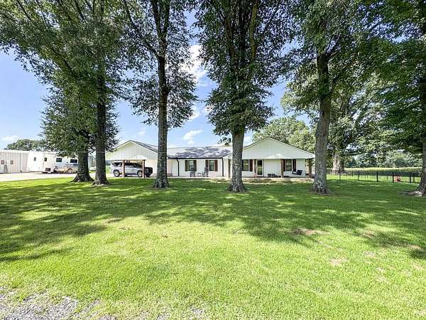 9.1 Acres of Land with Home for Auction in Dyersburg, Tennessee