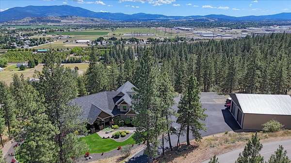 5.4 Acres of Land with Home for Sale in Otis Orchards, Washington
