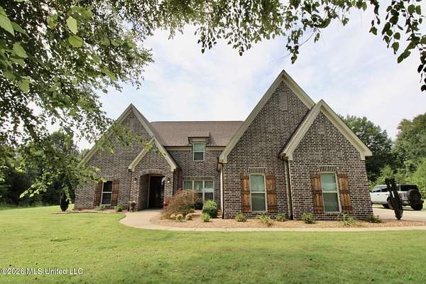 6.4 Acres of Land with Home for Sale in Olive Branch, Mississippi