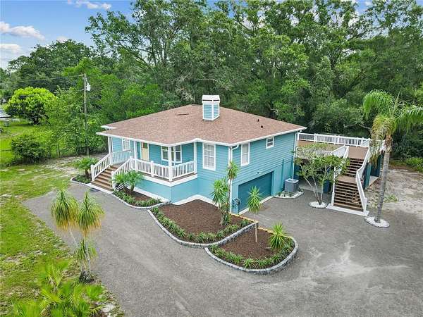 2 Acres of Land with Home for Sale in Land O' Lakes, Florida