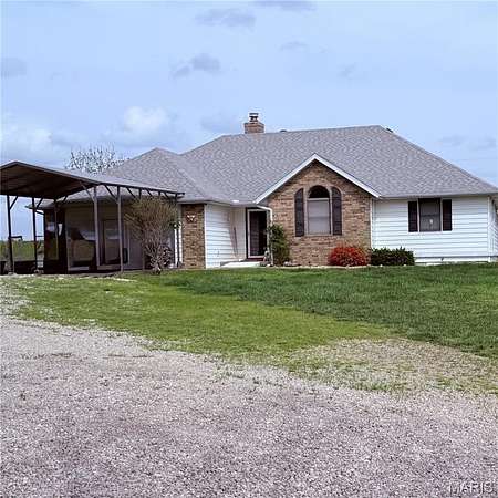 10 Acres of Land with Home for Sale in Lebanon, Missouri