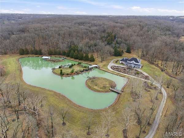 25.8 Acres of Recreational Land with Home for Sale in Columbia, Missouri