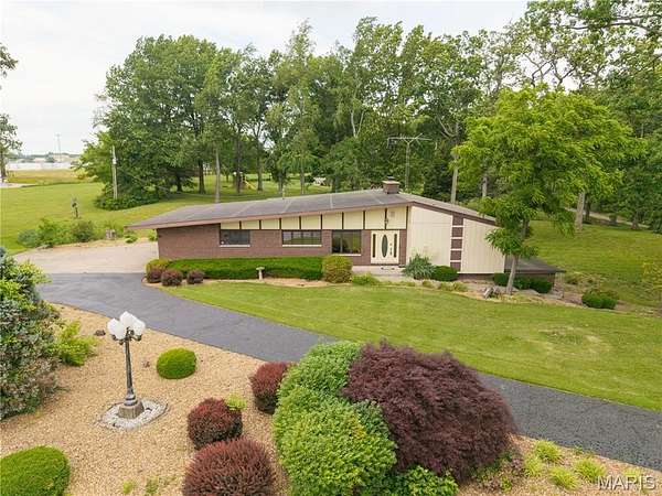 4.6 Acres of Land with Home for Sale in Perryville, Missouri