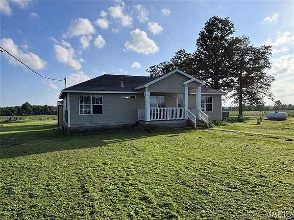 1.5 Acres of Land with Home for Sale in Campbell, Missouri