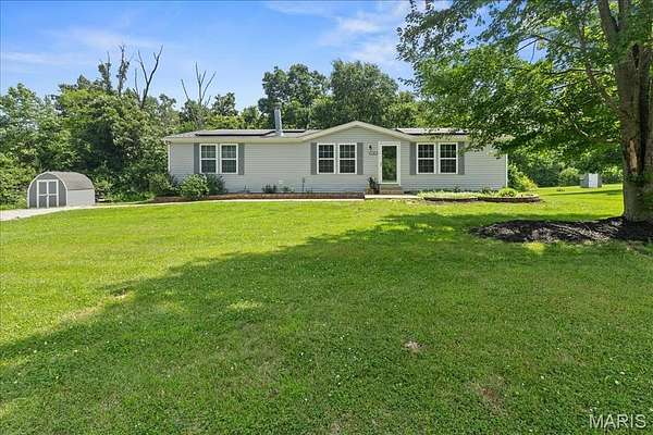 2 Acres of Land with Home for Sale in Foley, Missouri