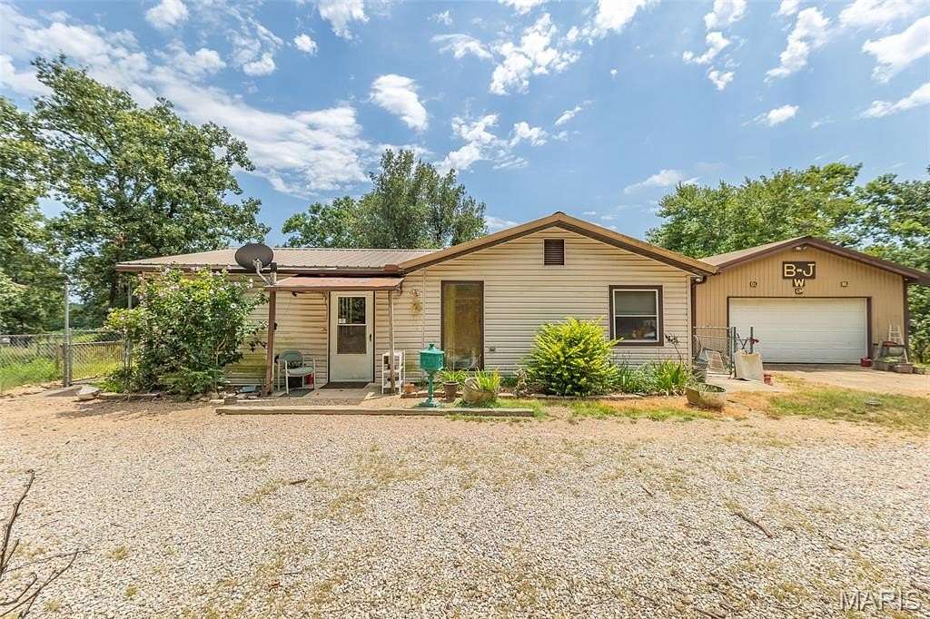 27.1 Acres of Land with Home for Sale in Ellsinore, Missouri