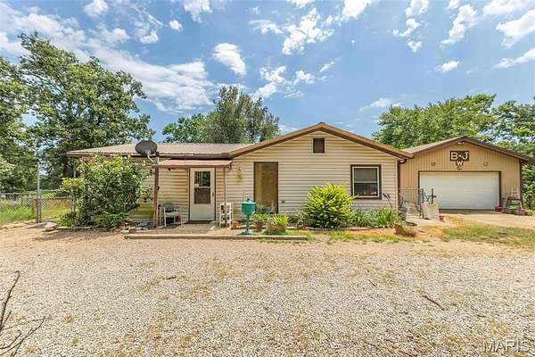 27.1 Acres of Land with Home for Sale in Ellsinore, Missouri