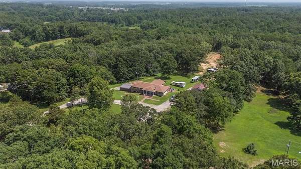 5.36 Acres of Land with Home for Sale in Poplar Bluff, Missouri