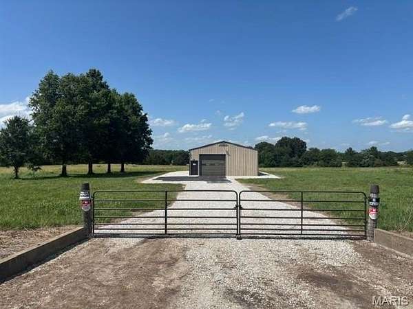 8.69 Acres of Land for Sale in Santa Fe, Missouri