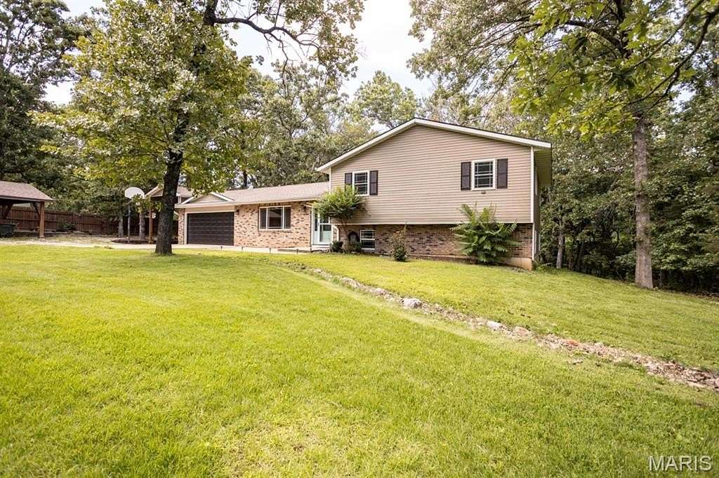 1.56 Acres of Land with Home for Sale in Waynesville, Missouri