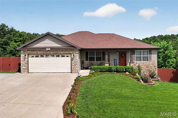 2.58 Acres of Land with Home for Sale in St. Robert, Missouri