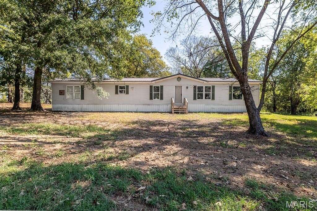 10 Acres of Land with Home for Sale in Harviell, Missouri