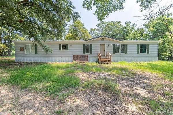 10 Acres of Land with Home for Sale in Harviell, Missouri