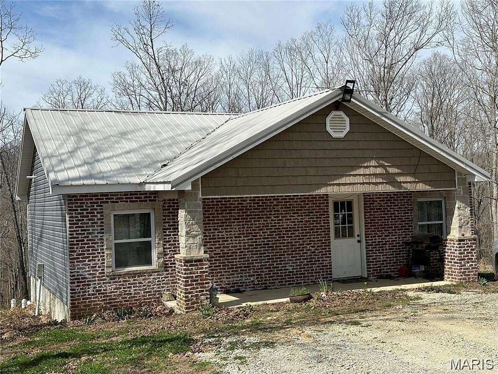 2.89 Acres of Land with Home for Sale in Marble Hill, Missouri