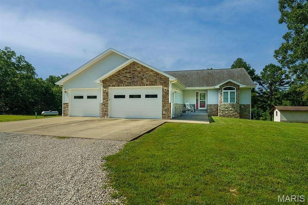 9.89 Acres of Land with Home for Sale in Waynesville, Missouri
