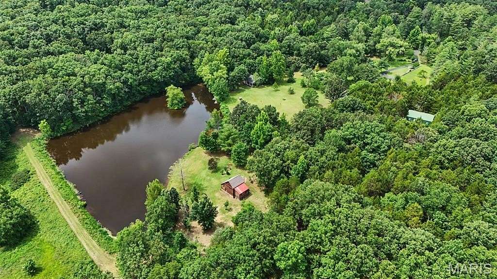 49 Acres of Land with Home for Sale in Leslie, Missouri