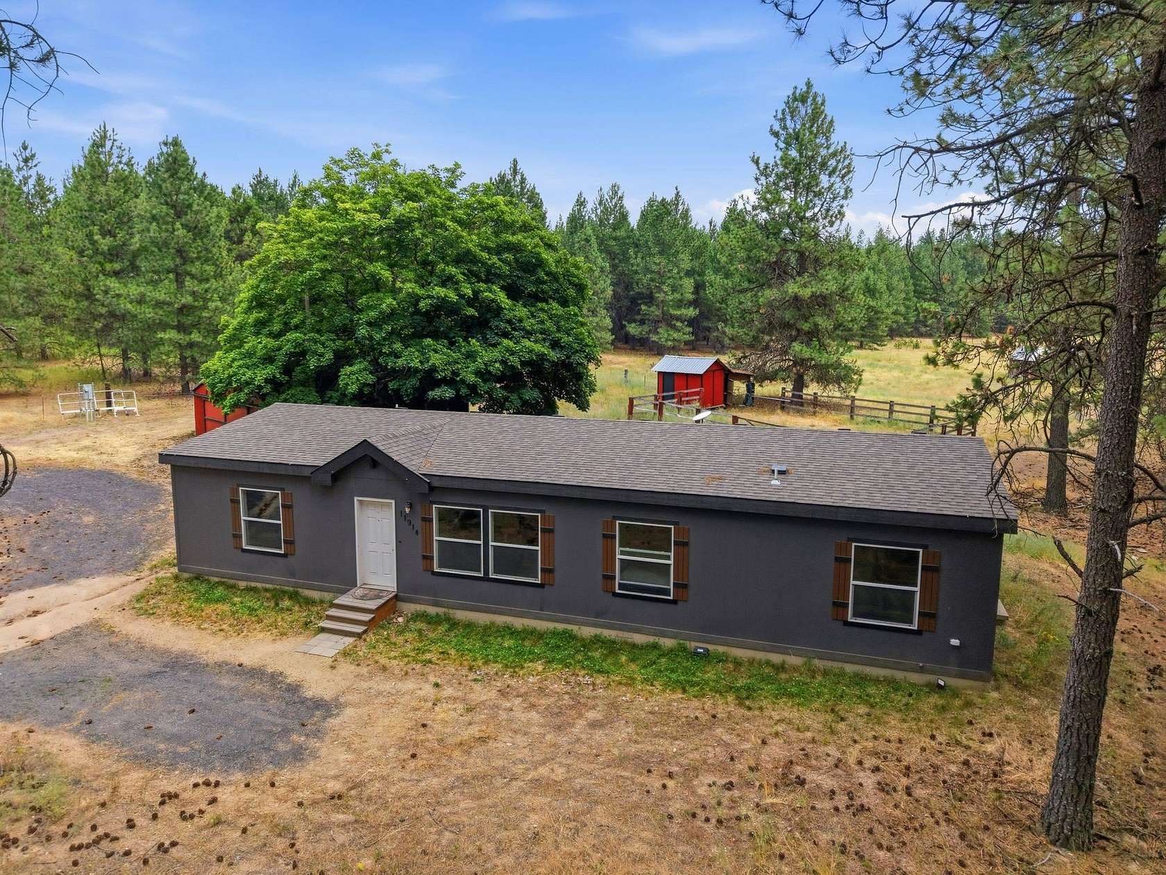 5.57 Acres of Land with Home for Sale in Elk, Washington