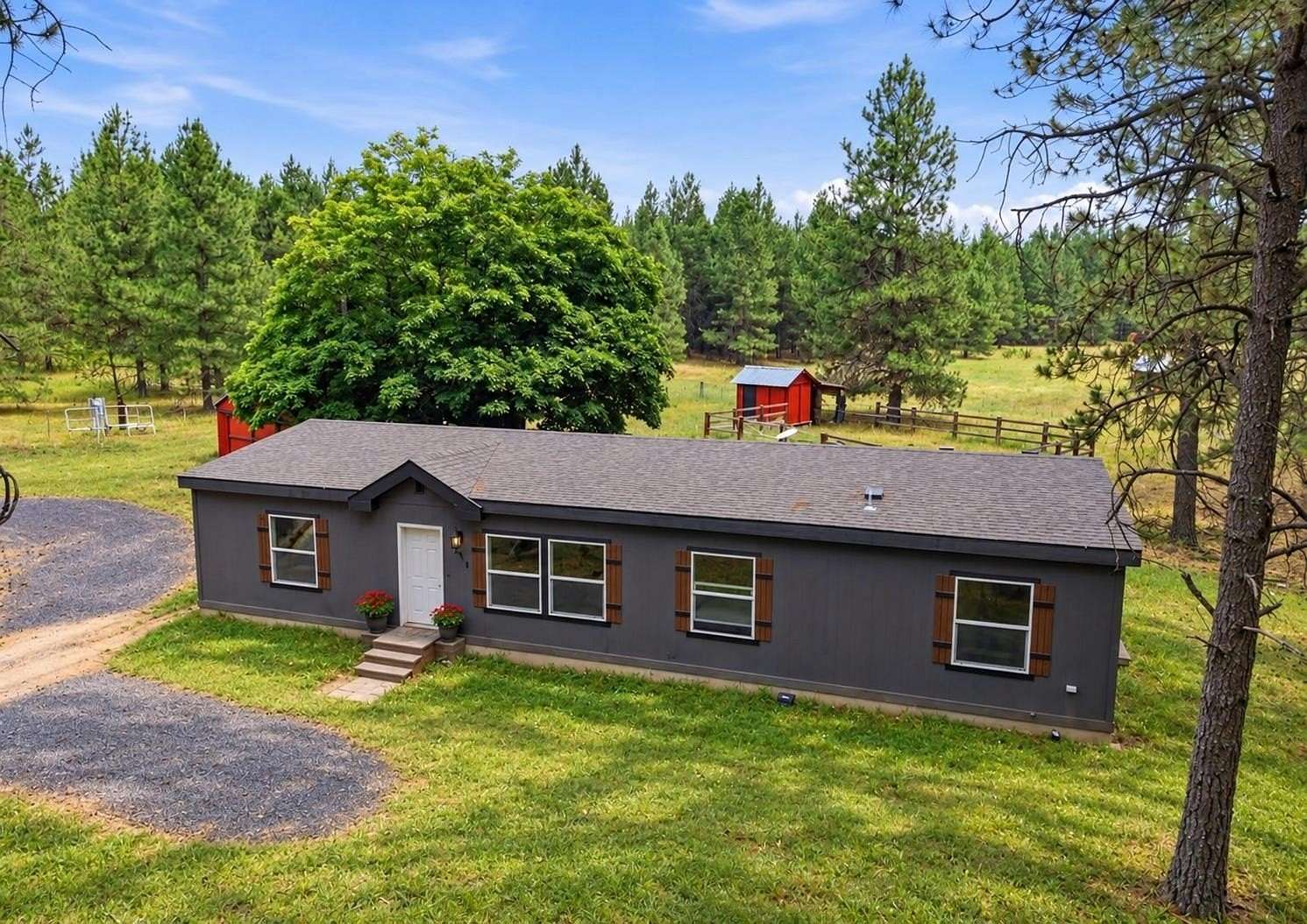 5.57 Acres of Land with Home for Sale in Elk, Washington