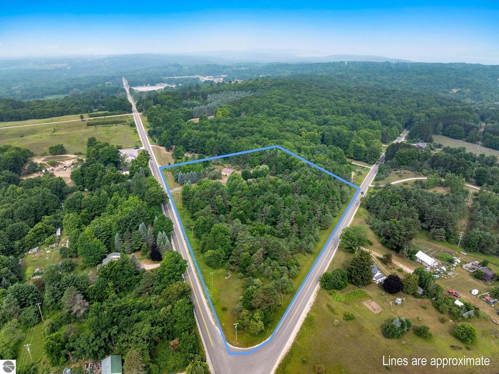 6.82 Acres of Land with Home for Sale in Benzonia, Michigan