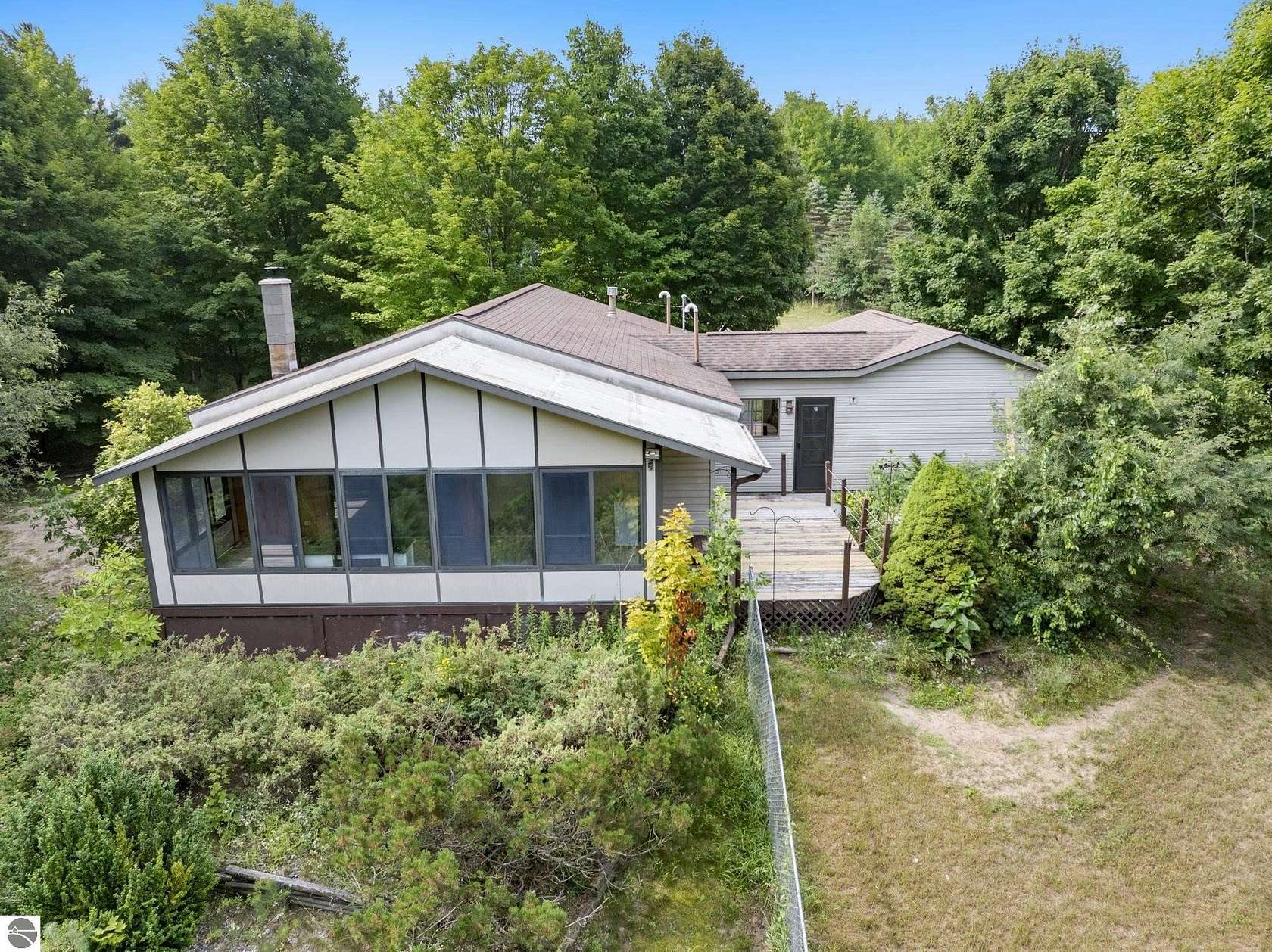 6.82 Acres of Land with Home for Sale in Benzonia, Michigan
