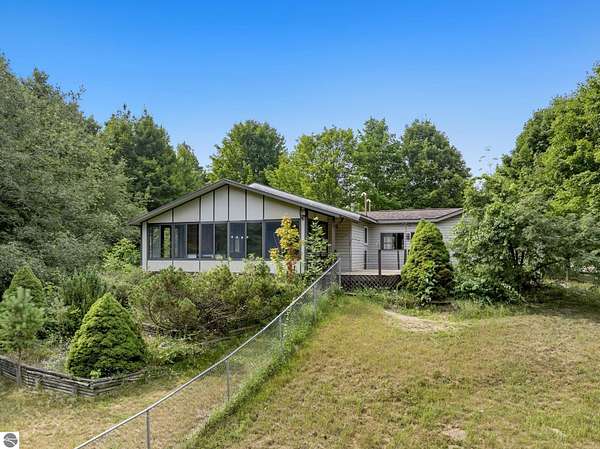 6.82 Acres of Land with Home for Sale in Benzonia, Michigan