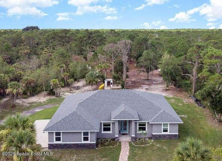 2.5 Acres of Land with Home for Sale in Grant-Valkaria, Florida