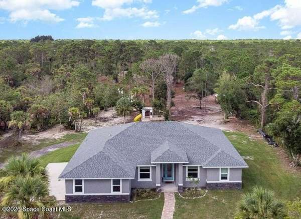 2.5 Acres of Land with Home for Sale in Grant-Valkaria, Florida