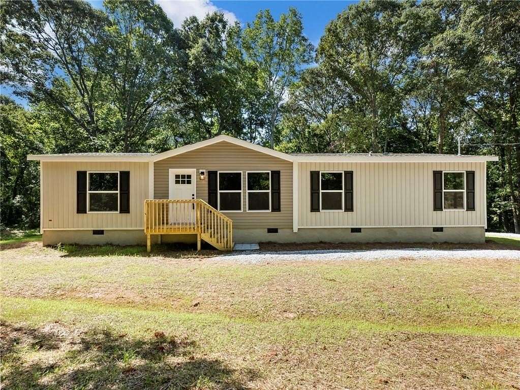 3.68 Acres of Land with Home for Sale in Maysville, Georgia