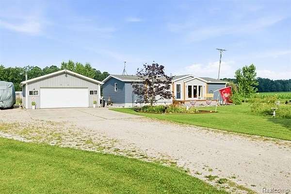 3 Acres of Land with Home for Sale in Kenockee Township, Michigan
