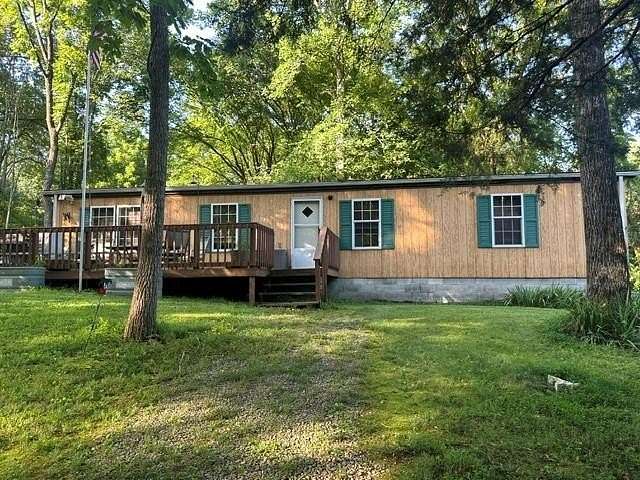 13.7 Acres of Land with Home for Sale in Hilham, Tennessee