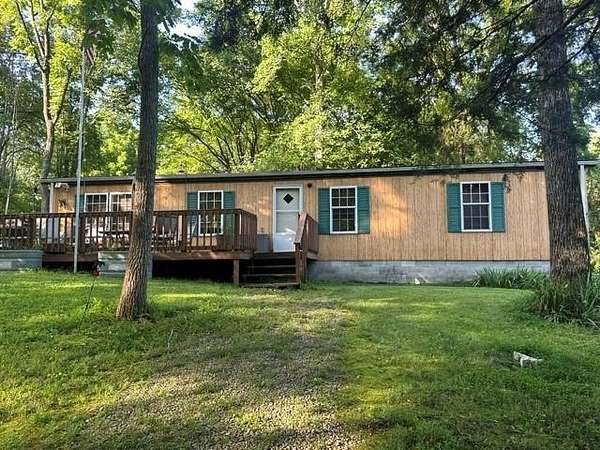 13.7 Acres of Land with Home for Sale in Hilham, Tennessee