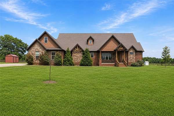 6.76 Acres of Land with Home for Sale in Prairie Grove, Arkansas