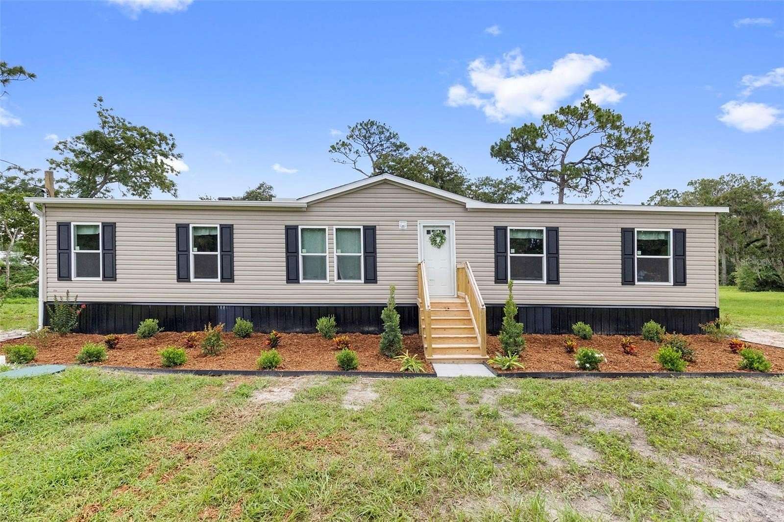 2.5 Acres of Land with Home for Sale in Spring Hill, Florida
